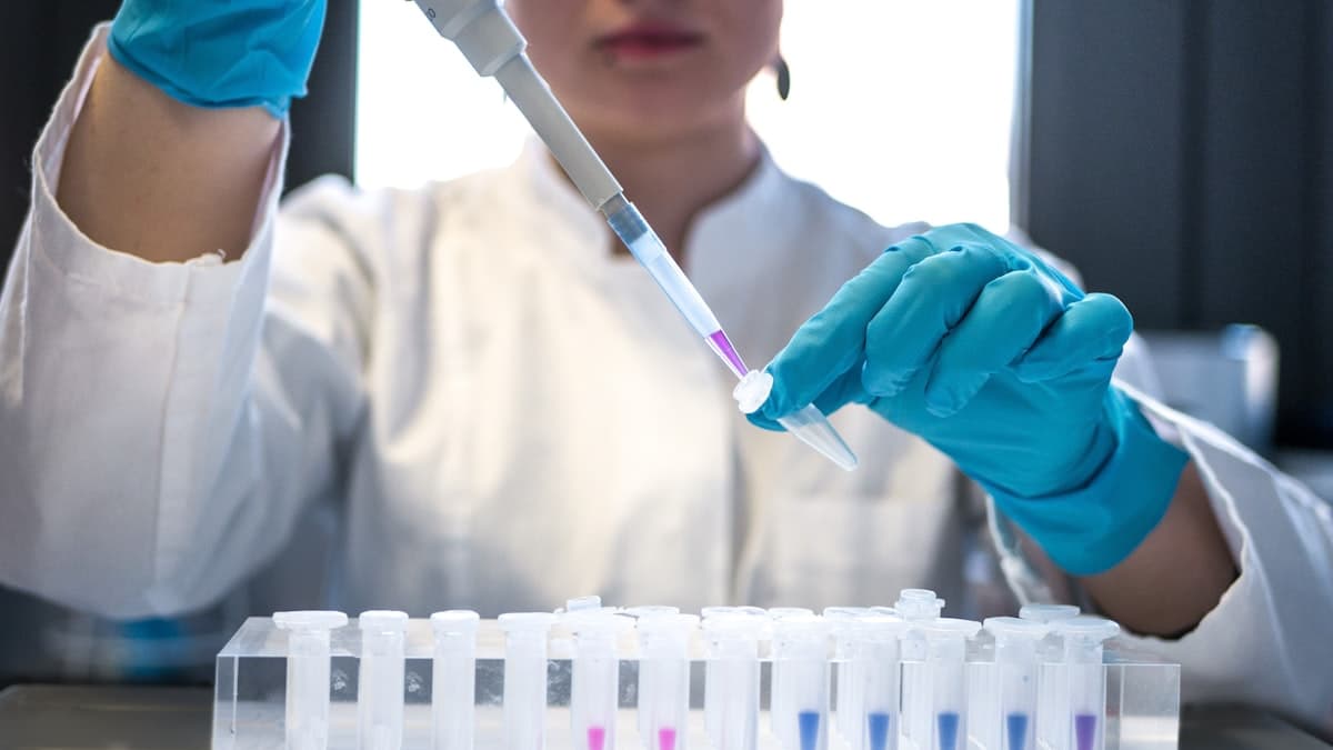 Scientist analysing a sample in a laboratory