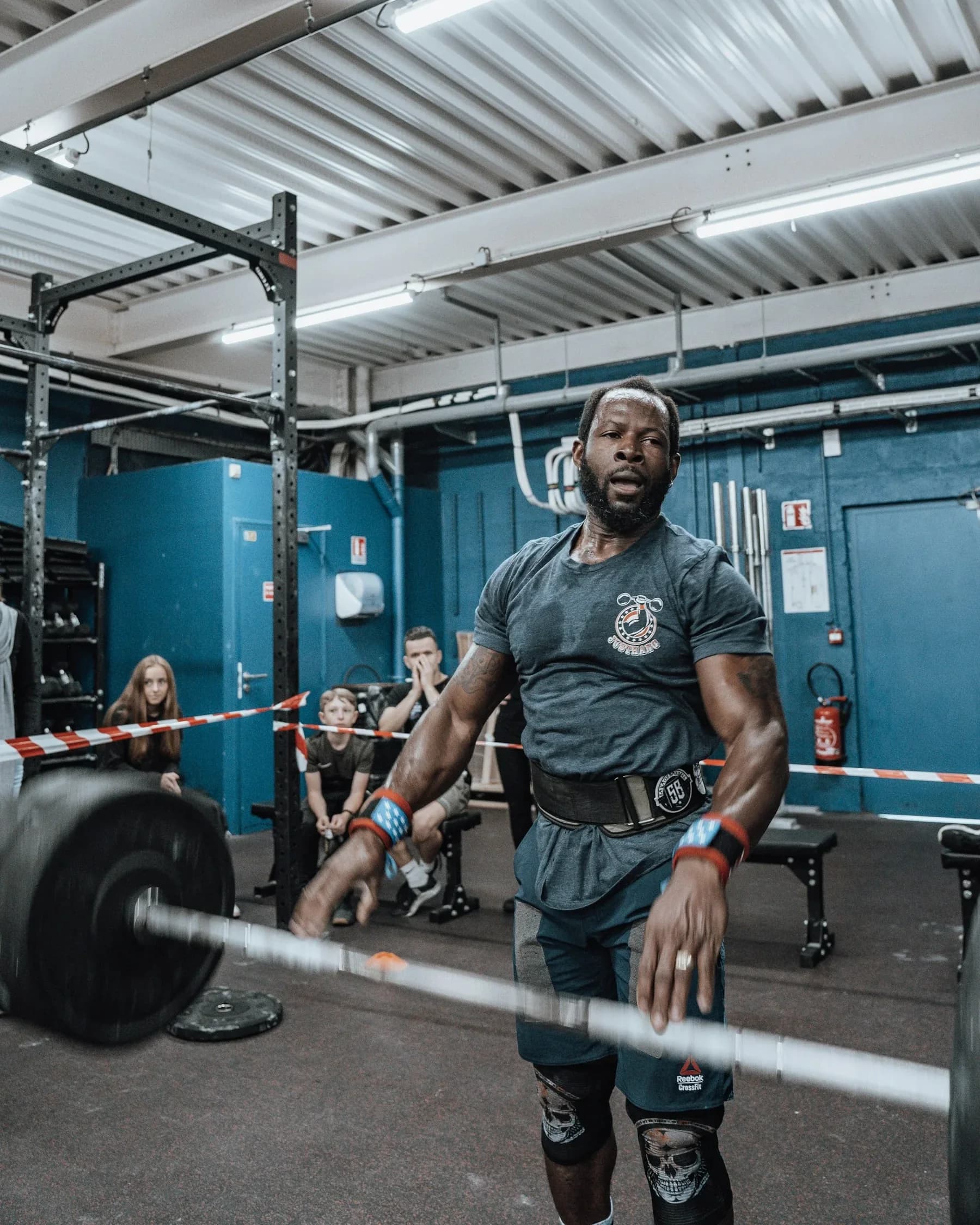 Athlete lifting a barbell during strength training